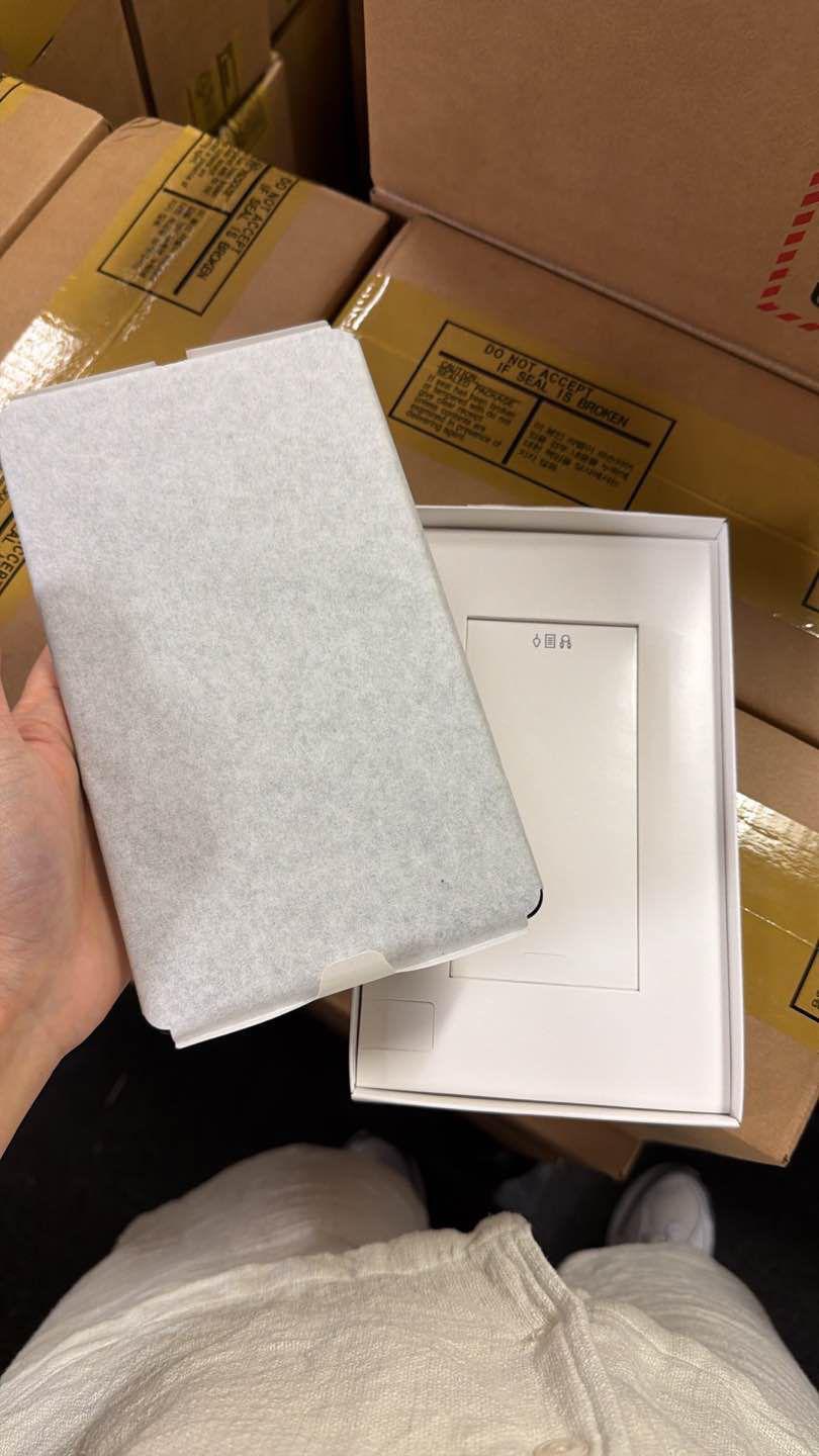 Actual gray tablet in protective wrapping